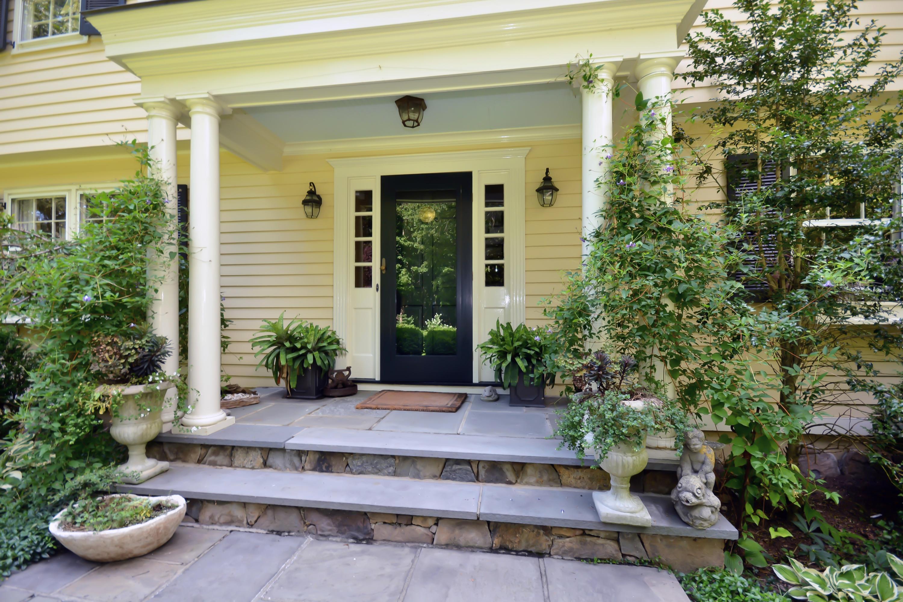 47 Delafield Island Road Darien, CT 06820 - Photo 2 of 26 a view of a house with potted plants