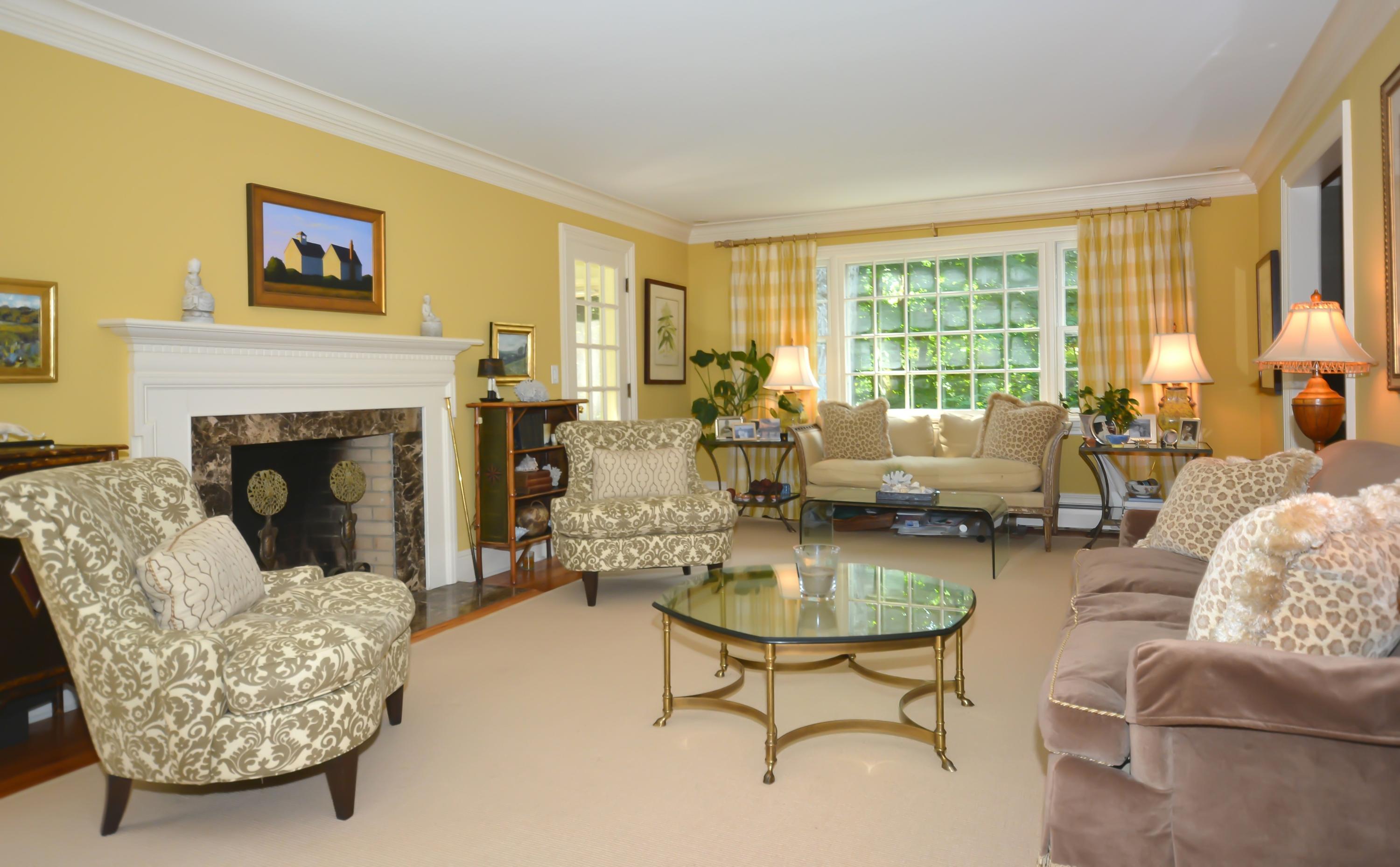 47 Delafield Island Road Darien, CT 06820 - Photo 4 of 26 a living room with furniture large window and a fireplace