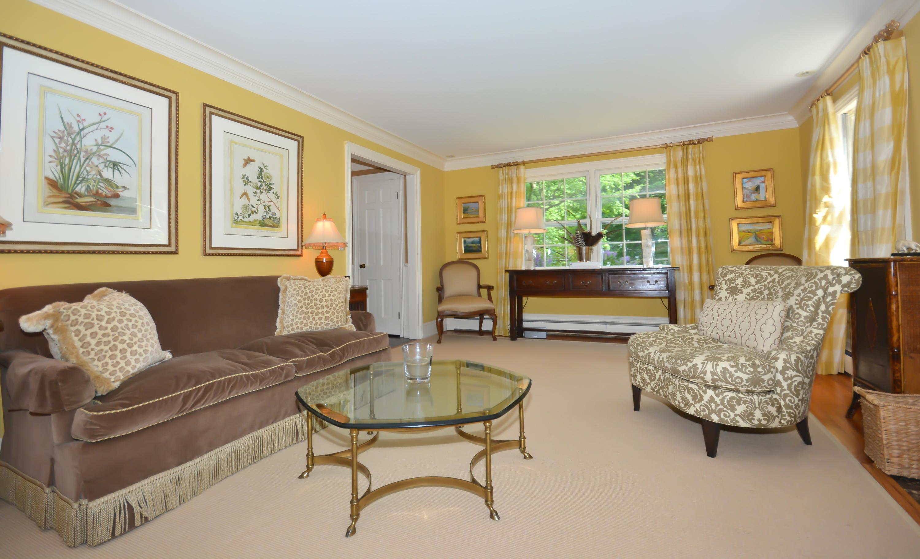 47 Delafield Island Road Darien, CT 06820 - Photo 5 of 26 a living room with furniture and a large window