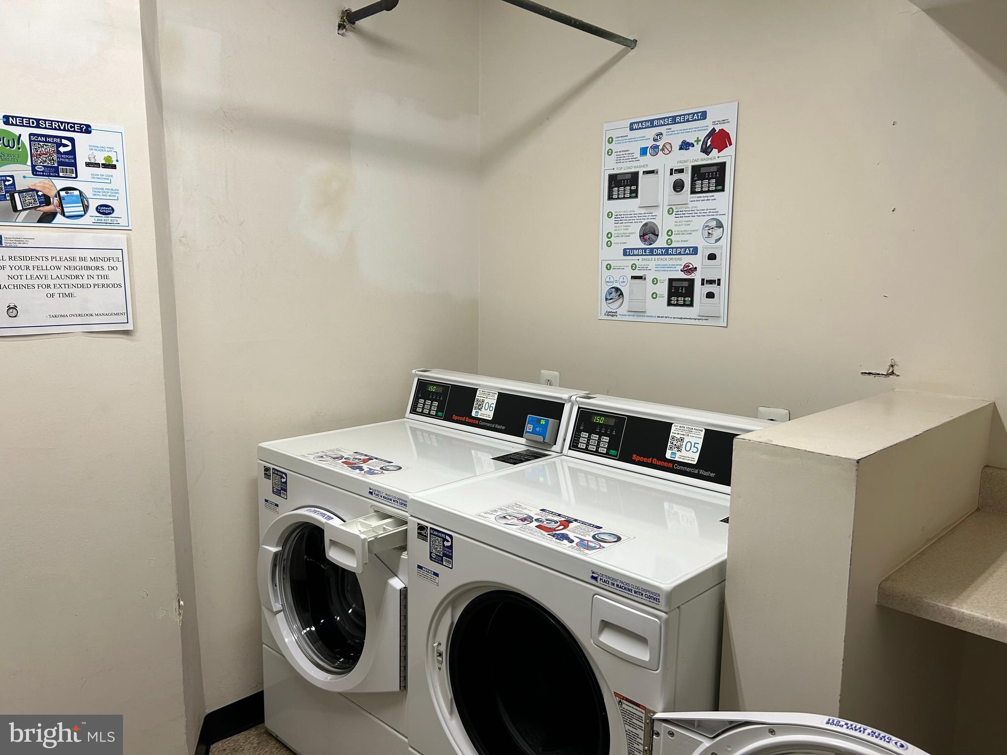 7333 New Hampshire Avenue, Unit 1107 Takoma Park, MD 20912 - Photo 22 of 25 a utility room with dryer and washer