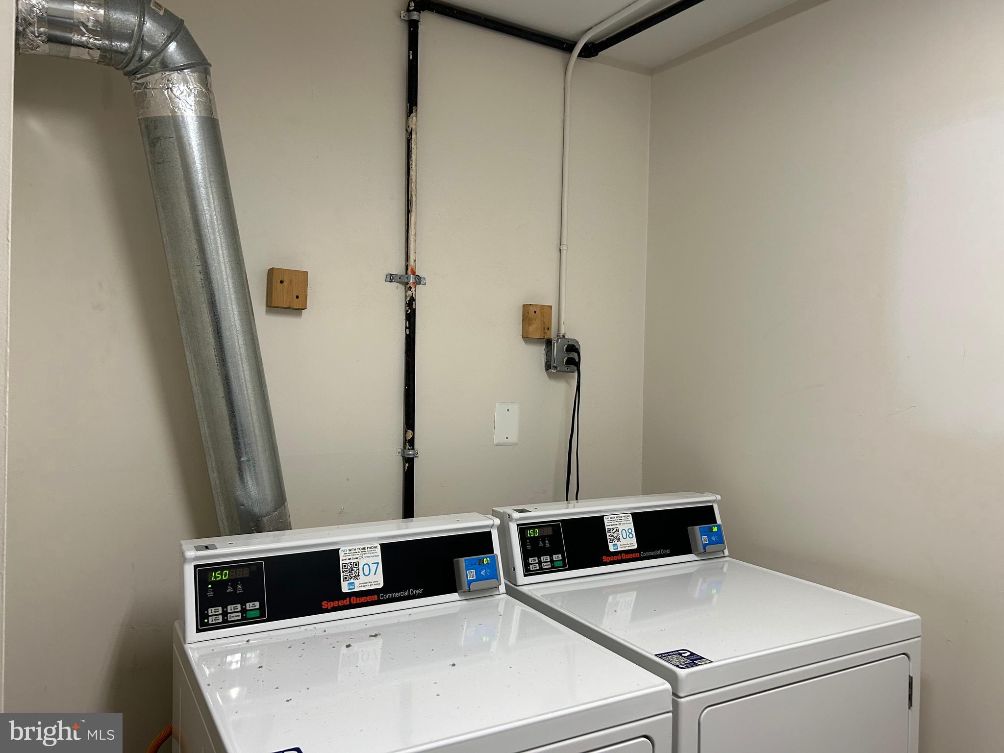 7333 New Hampshire Avenue, Unit 1107 Takoma Park, MD 20912 - Photo 23 of 25 a bathroom with a sink and a mirror