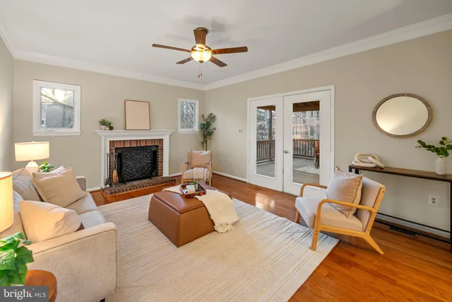 a view of a tables and chairs in a back yard of the house
