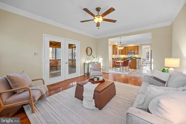 a view of backyard with outdoor seating and plants