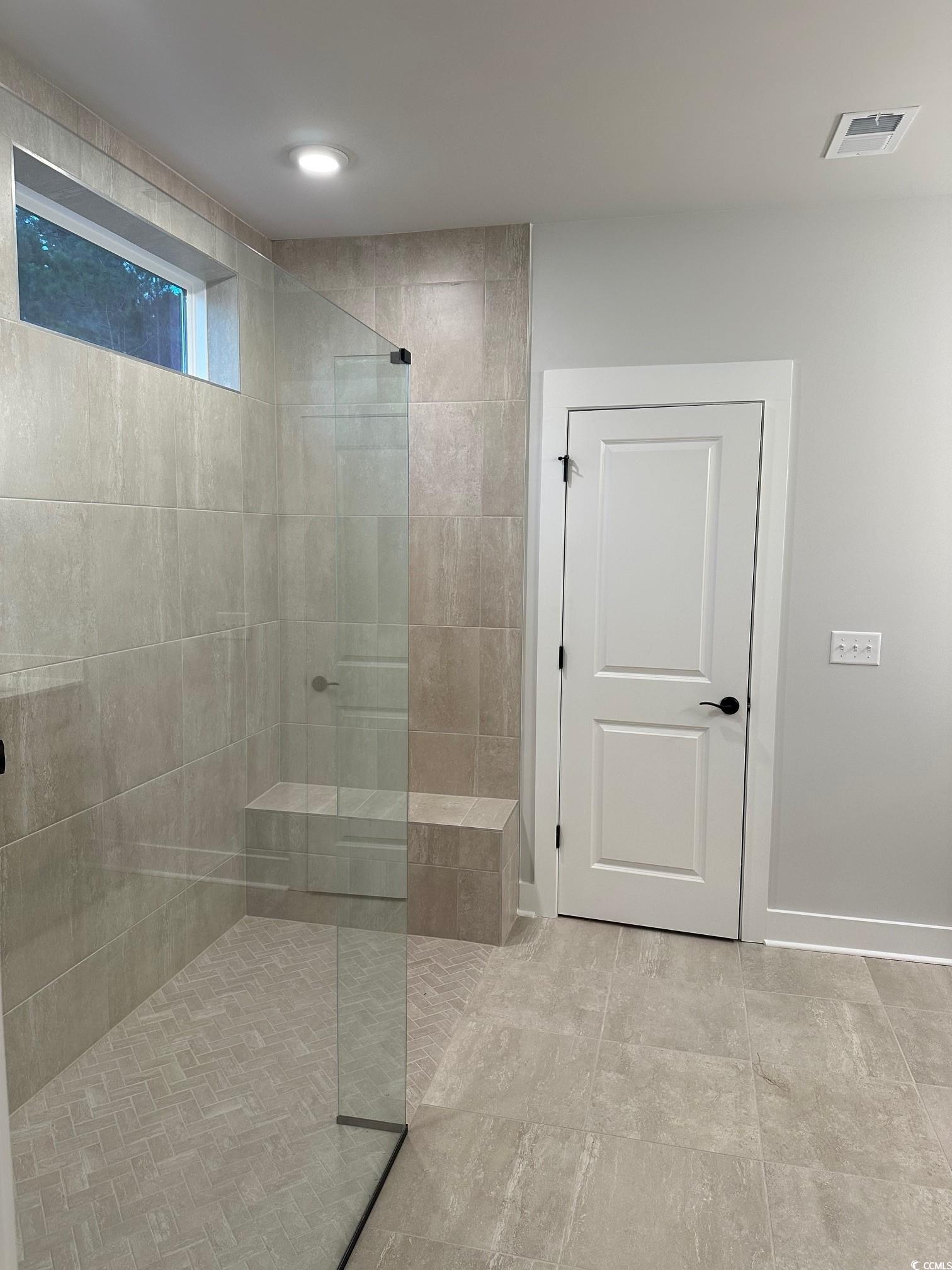 85 Northbrook Drive Murrells Inlet, SC 29576 - Photo 16 of 34 Bathroom featuring walk in shower and baseboards