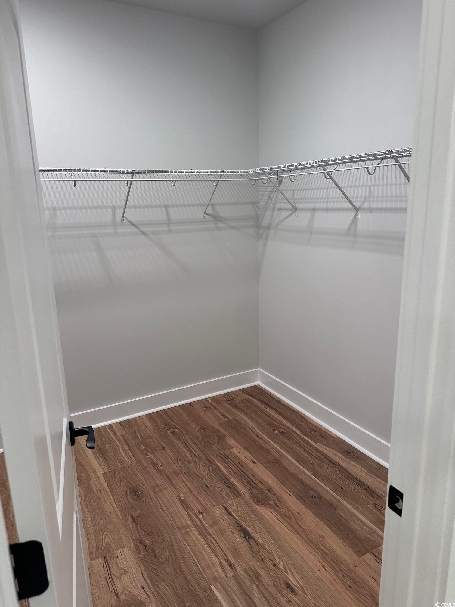 85 Northbrook Drive Murrells Inlet, SC 29576 - Photo 18 of 34 Spacious closet featuring dark wood-type flooring