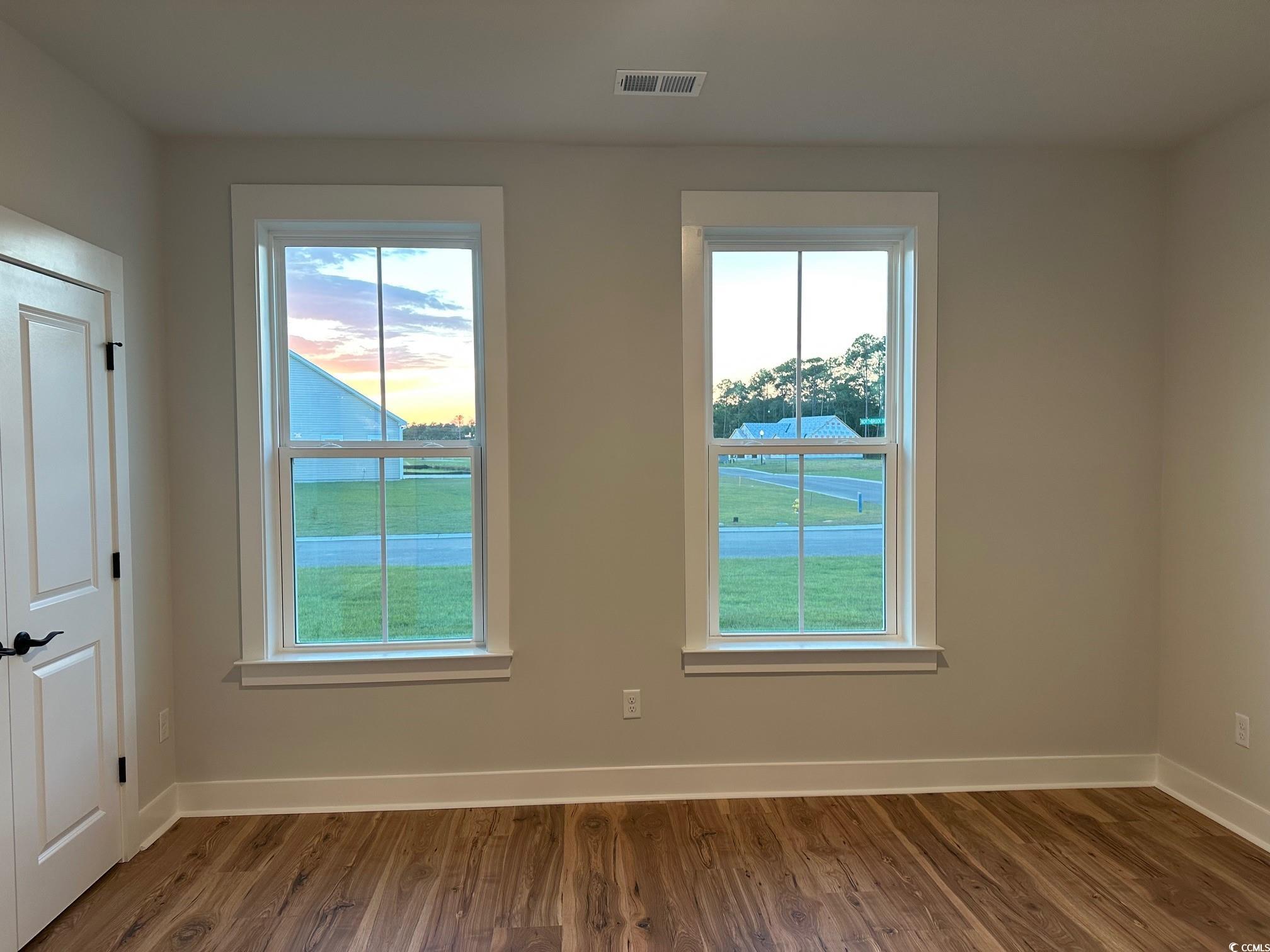 85 Northbrook Drive Murrells Inlet, SC 29576 - Photo 20 of 34 Spare room with baseboards and wood finished floors