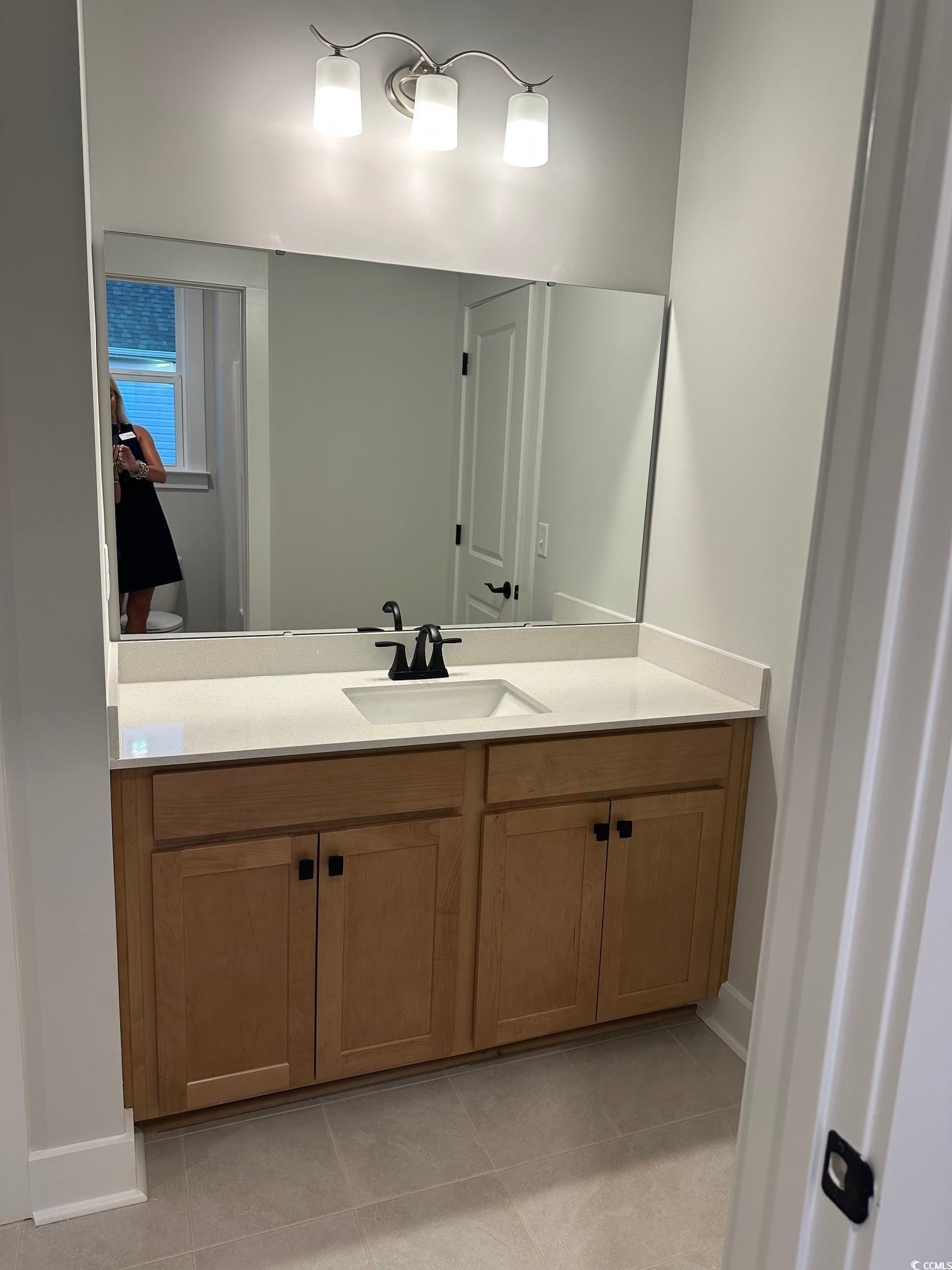 85 Northbrook Drive Murrells Inlet, SC 29576 - Photo 21 of 34 Bathroom featuring vanity and light tile patterned floors