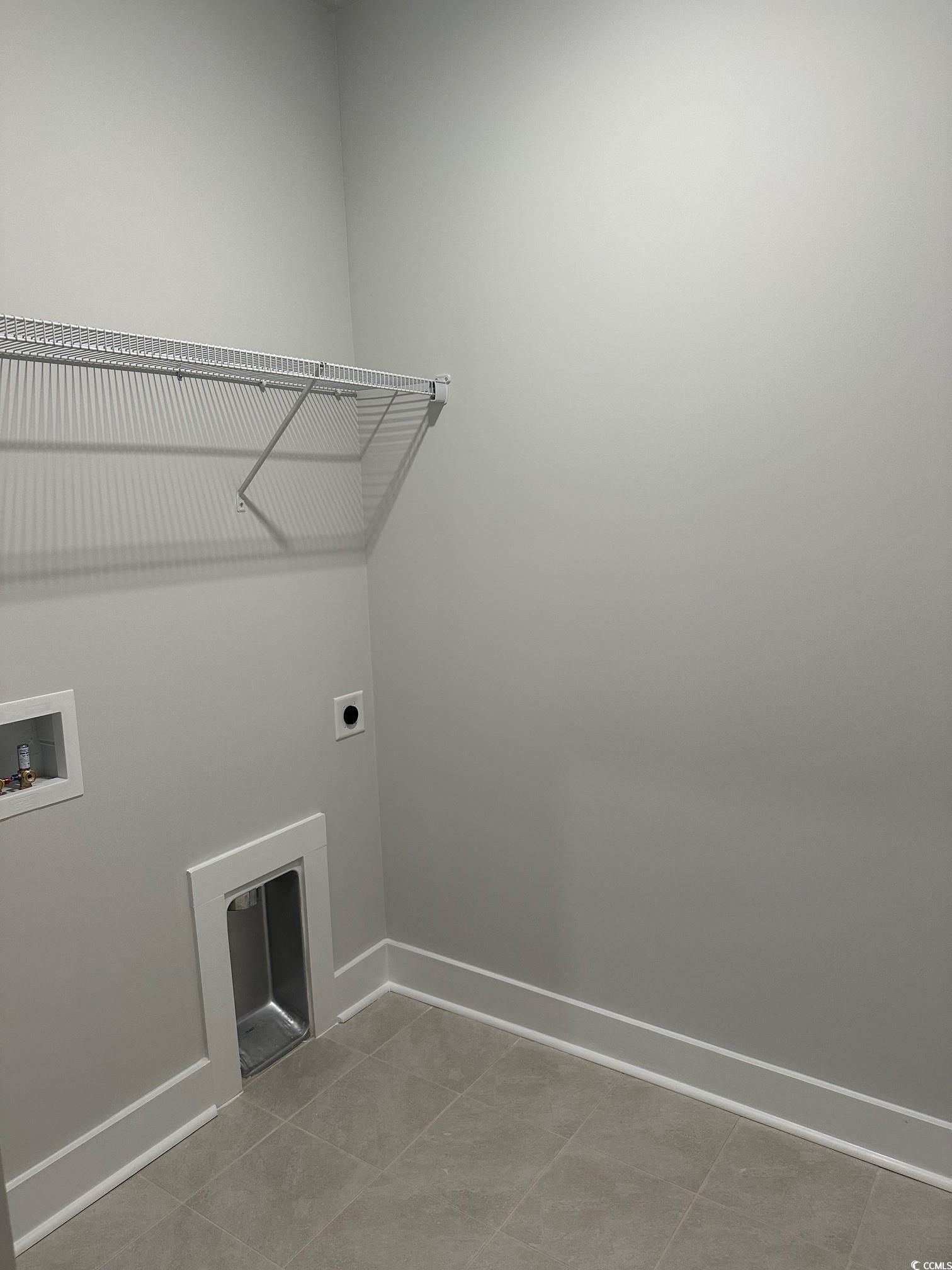 85 Northbrook Drive Murrells Inlet, SC 29576 - Photo 23 of 34 Laundry area with light tile patterned floors, electric dryer hookup, and washer hookup