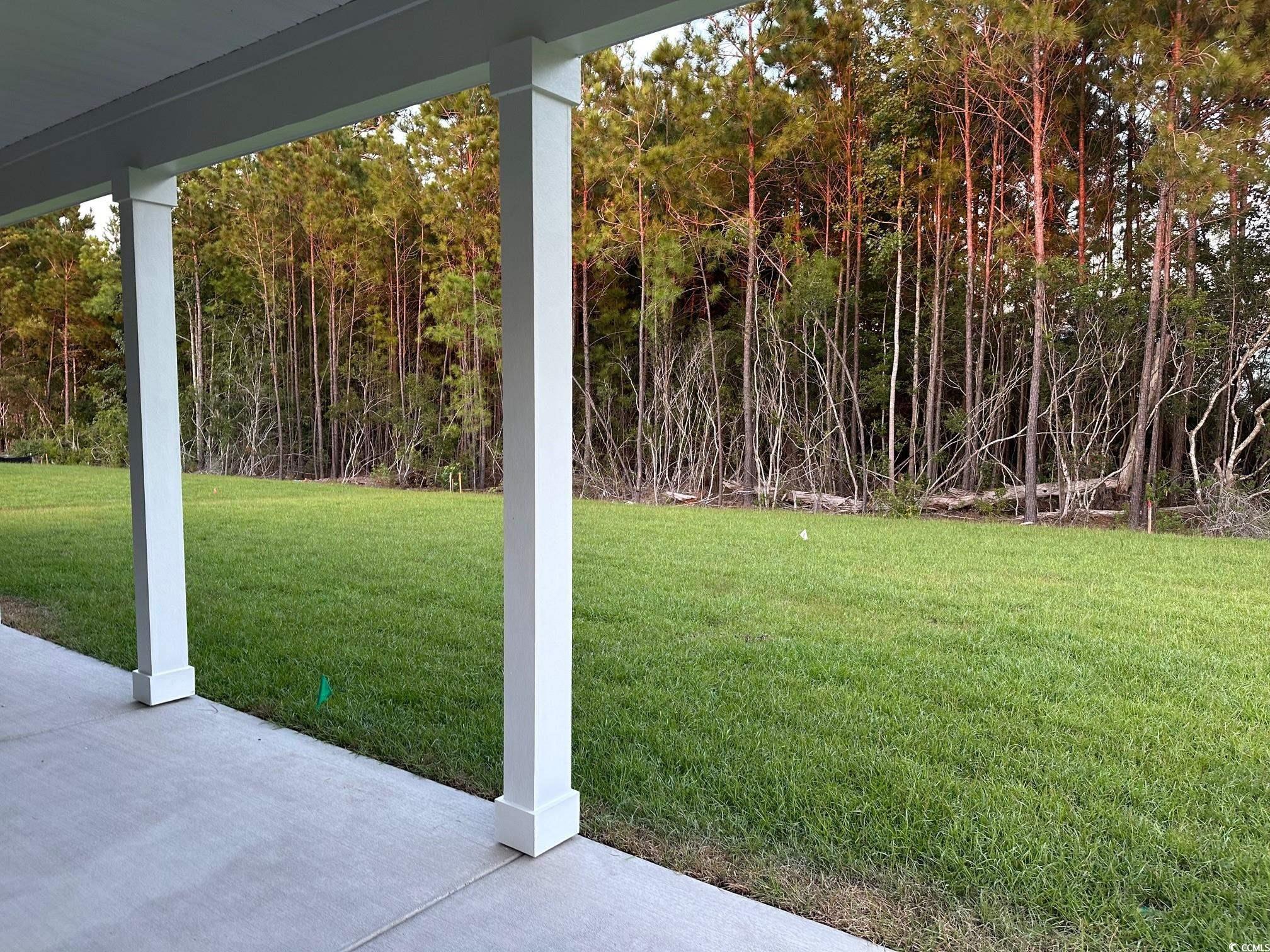 85 Northbrook Drive Murrells Inlet, SC 29576 - Photo 26 of 34 View of grassy yard with a patio area