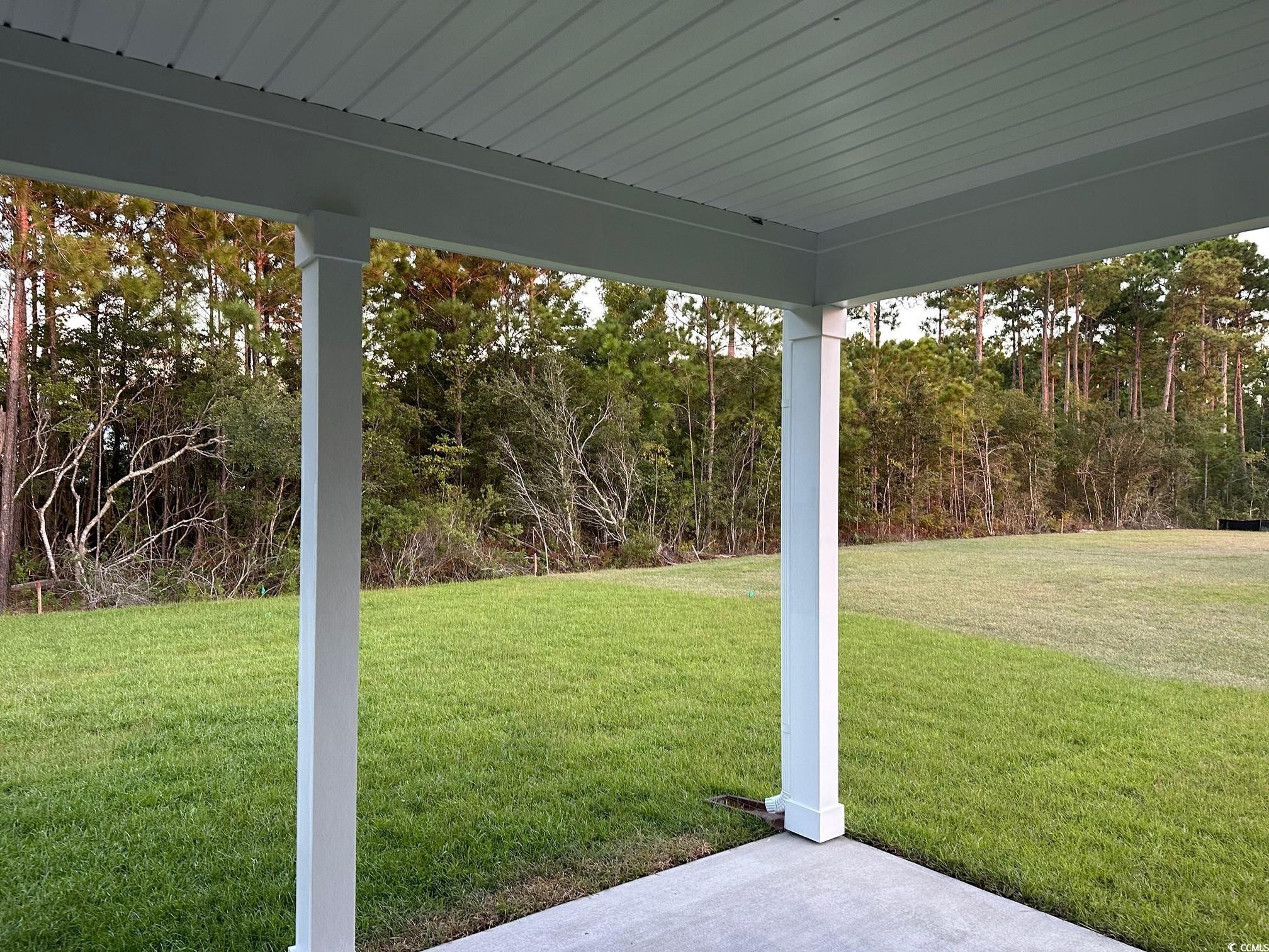 85 Northbrook Drive Murrells Inlet, SC 29576 - Photo 27 of 34 View of grassy yard featuring a patio