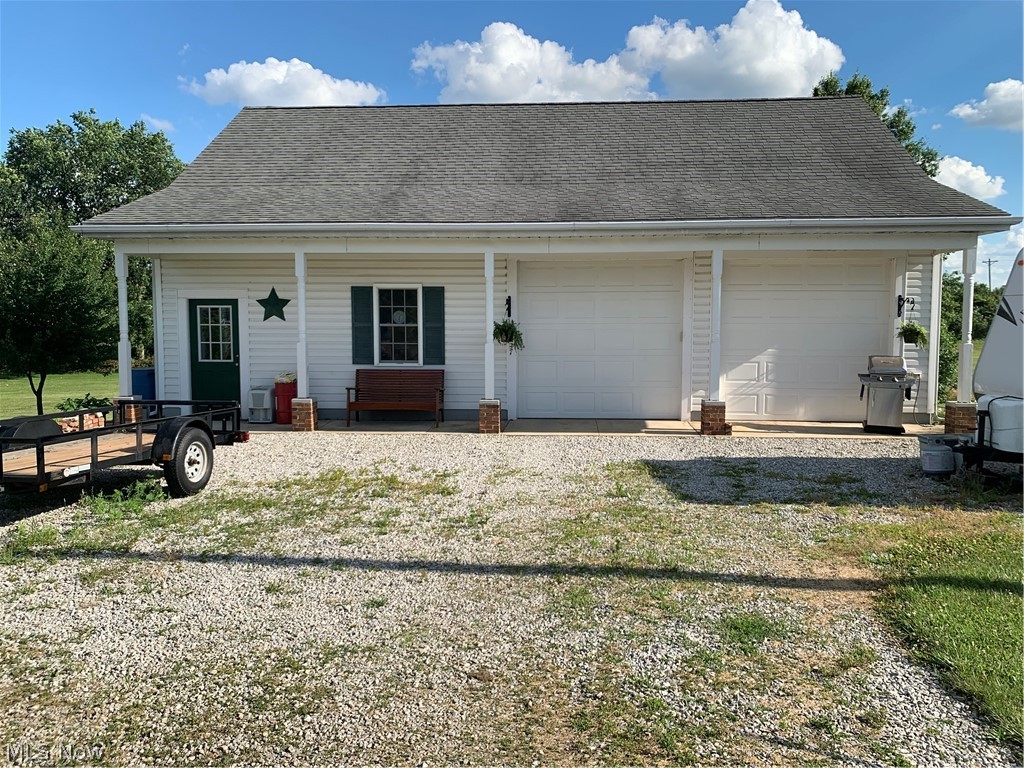 1668 Lyon Road Willard, OH 44890 - Photo 32 of 35 40 x 30 outbuilding fully insulated & drywalled, 30x12 workshop is heated