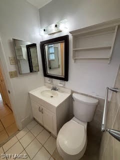 18215 Iris Road Fort Myers, FL 33967 - Photo 16 of 34 a bathroom with a toilet sink and mirror