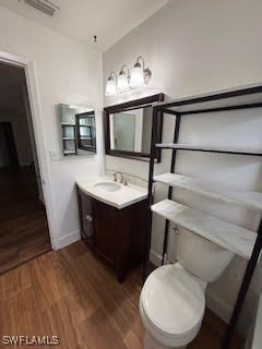 18215 Iris Road Fort Myers, FL 33967 - Photo 20 of 34 a bathroom with a toilet a sink and a mirror