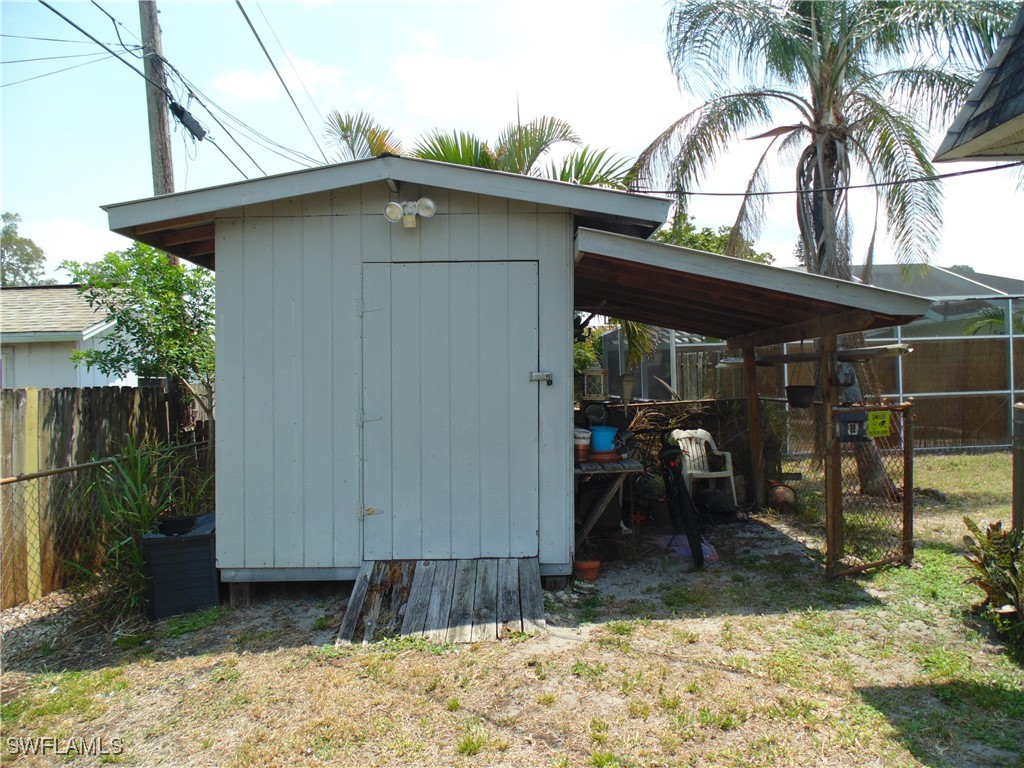 18215 Iris Road Fort Myers, FL 33967 - Photo 32 of 34 a view of a backyard