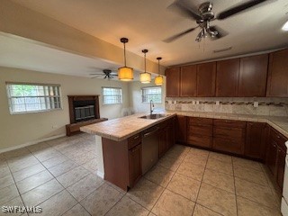 18215 Iris Road Fort Myers, FL 33967 - Photo 4 of 34 a kitchen with a stove sink and cabinets