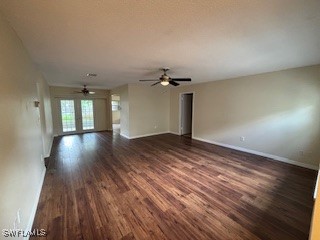 18215 Iris Road Fort Myers, FL 33967 - Photo 7 of 34 wooden floor in an empty room with a window