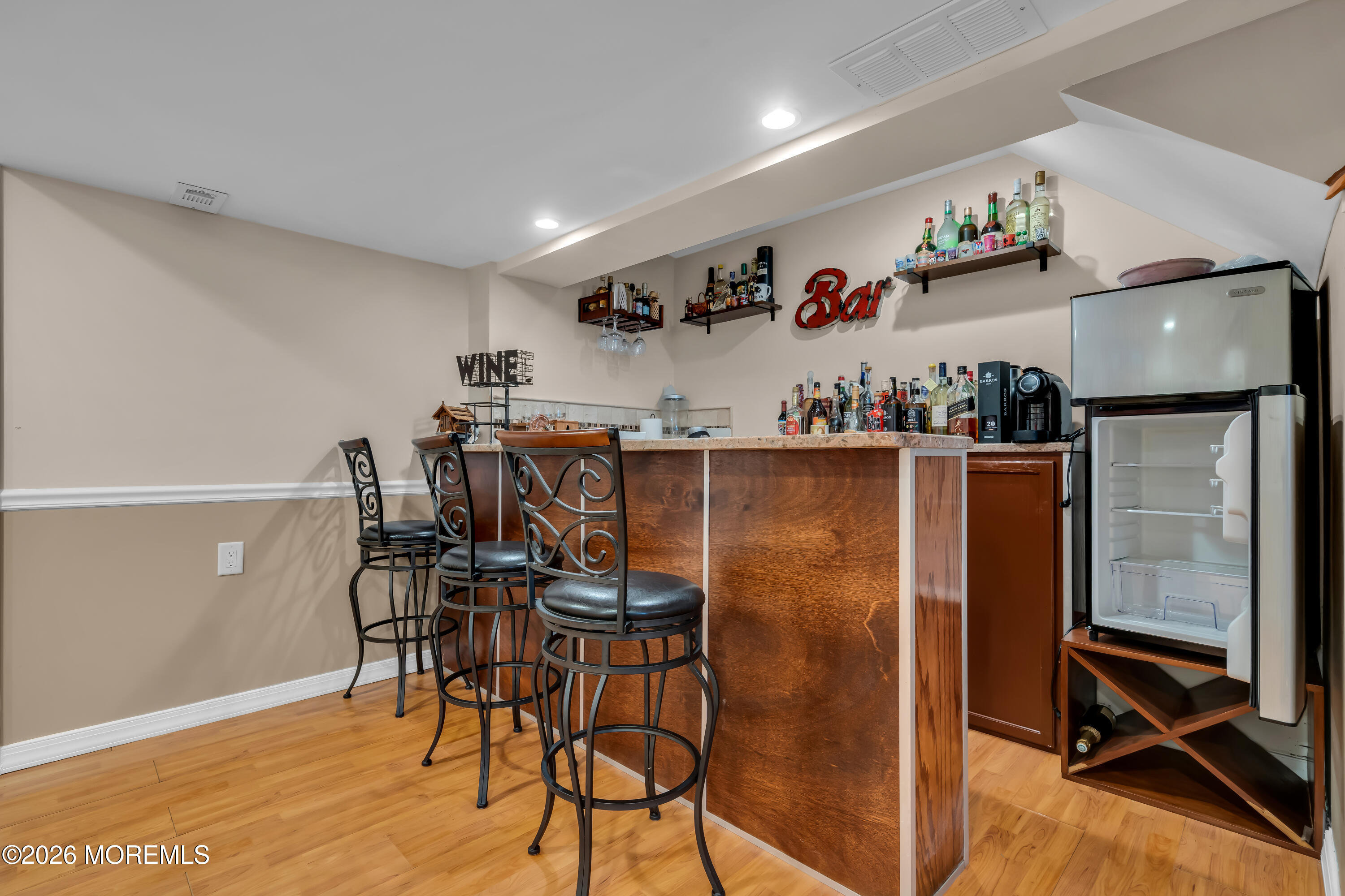 10 Beacon Place Old Bridge, NJ 08857 - Photo 61 of 72 a view of a dining room with furniture and wooden floor