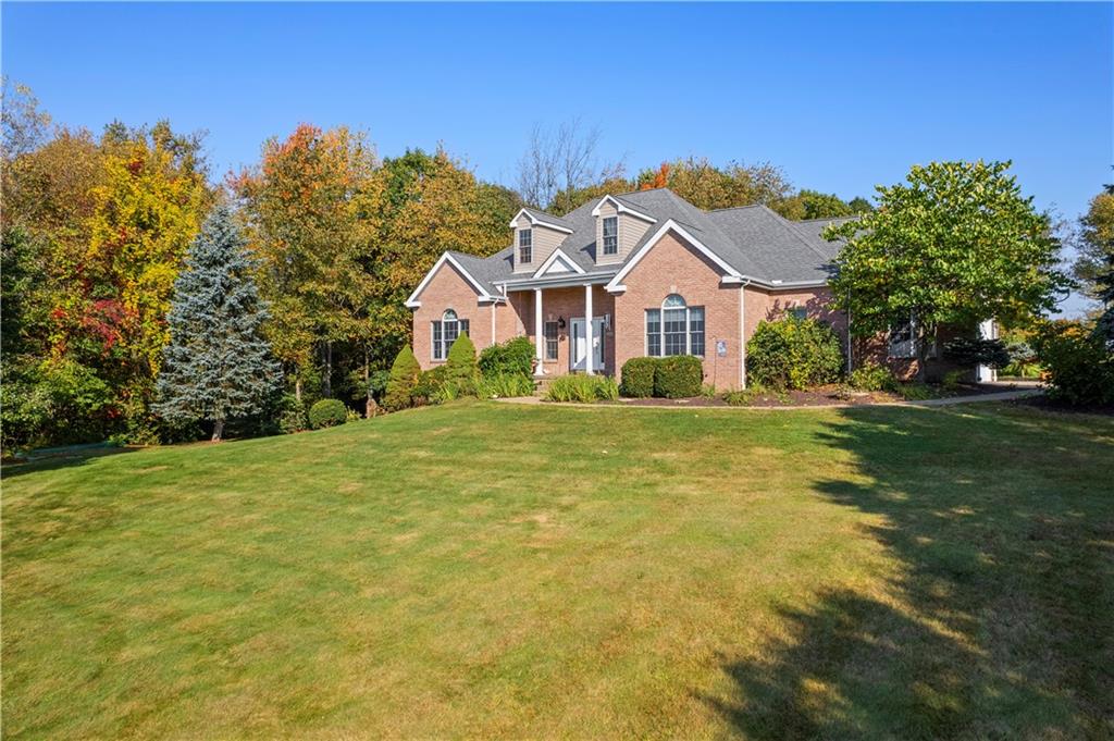 747 Achortown Road Beaver Falls, PA 15010 - Photo 2 of 28 a front view of a house with a yard