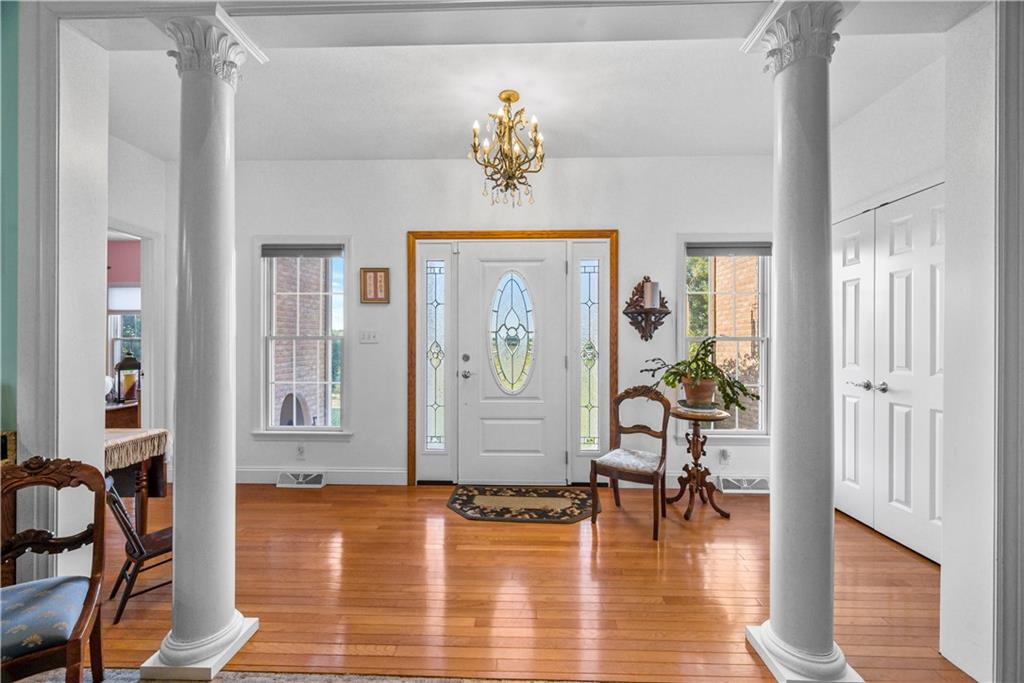 747 Achortown Road Beaver Falls, PA 15010 - Photo 3 of 28 a view of livingroom with furniture wooden floor and windows