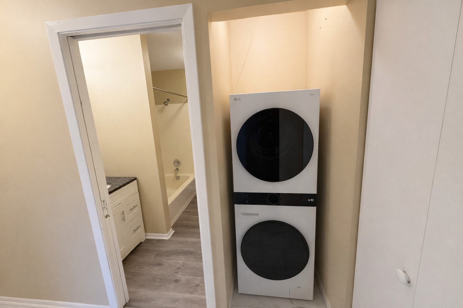 1462 Stonebridge Circle, Unit F10 Wheaton, IL 60189 - Photo 11 of 19 a view of a hallway with washer and dryer
