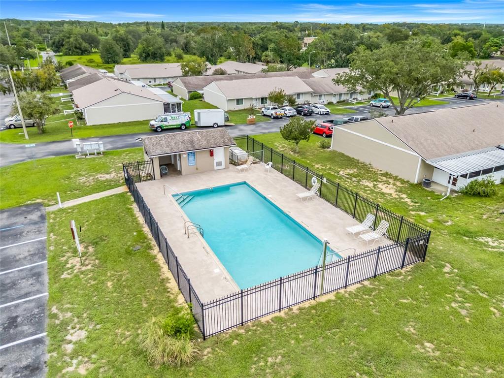 30024 Tavares Ridge Boulevard, Unit 62 Tavares, FL 32778 - Photo 30 of 31 an aerial view of tennis court