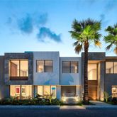 a view of multiple houses with a yard