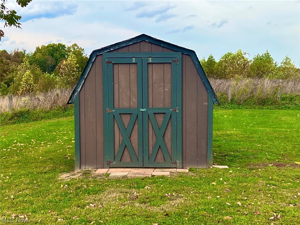 36555 Flat Rock Road Barnesville, OH 43713 - Photo 33 of 35 View of shed / structure featuring a lawn