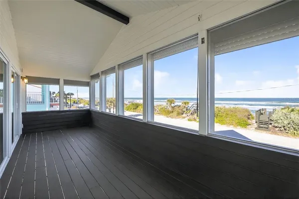 a kitchen with stainless steel appliances a stove microwave and cabinets