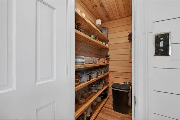 a view of a door and a window