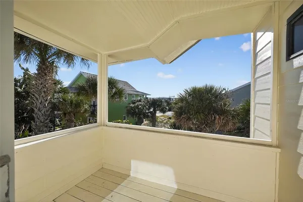 a bathroom with a granite countertop sink a mirror and shower