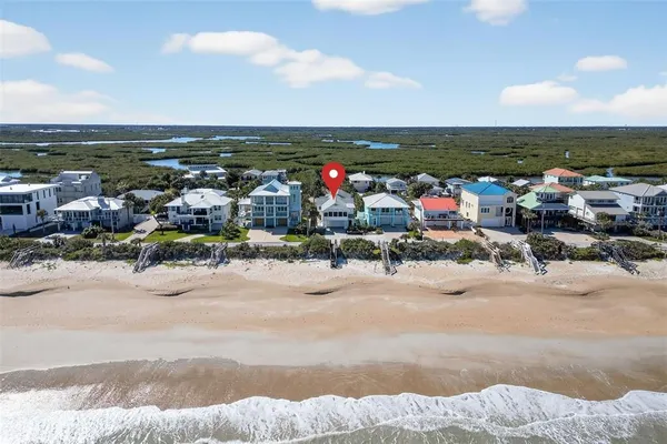 a view of a city with an ocean view