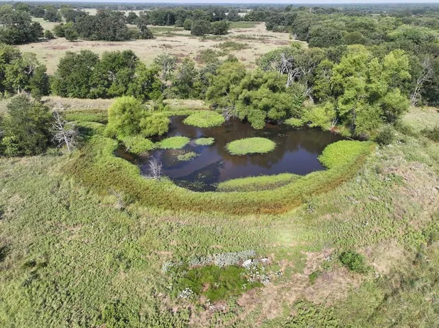 a view of a lake with a house