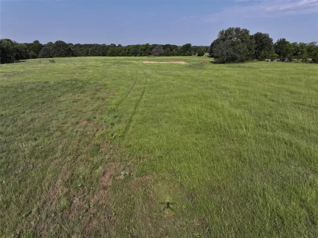 a view of an ocean and a mountain