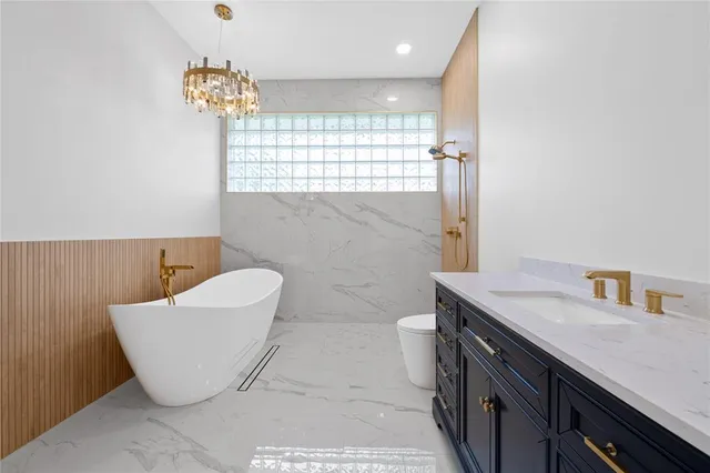 a bathroom with a sink and a bathtub