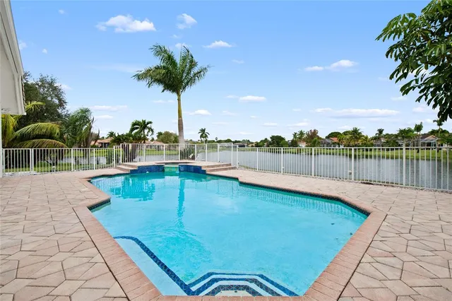 $1,090,000 | 10203 Northwest 50th Place, Coral Springs, FL 33076