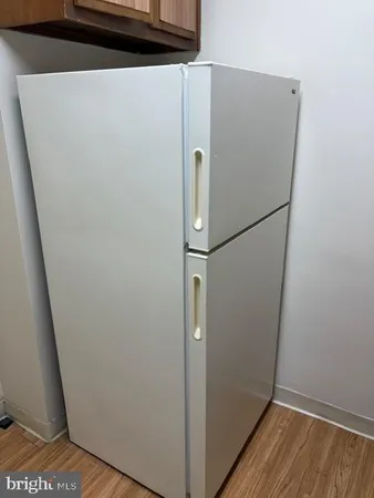 a view of a storage & utility room with washer dryer