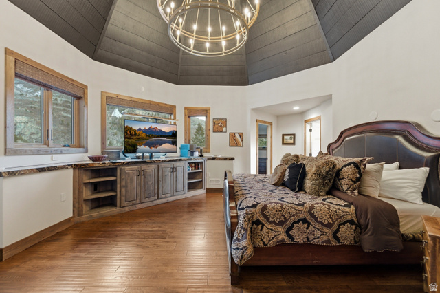 2687 Stewart Road Sundance, UT 84604 - Photo 9 of 48 Bedroom featuring a chandelier and dark wood-type flooring