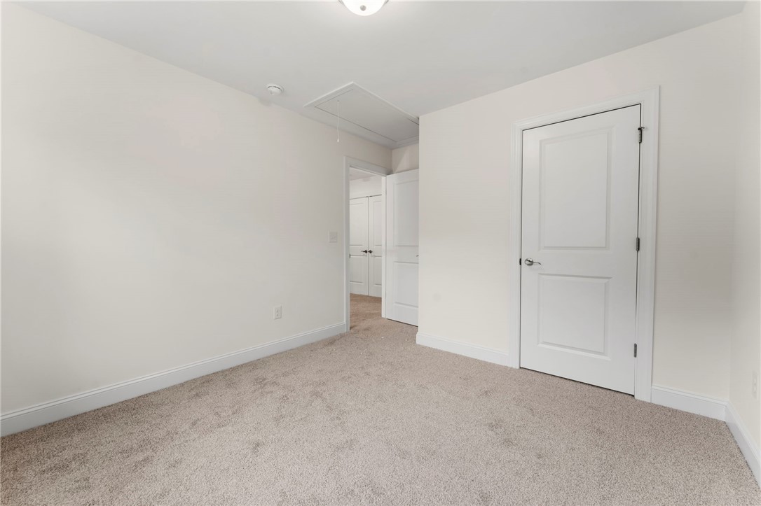 505 Fire Tower Road Williamston, SC 29697 - Photo 24 of 37 This inviting bedroom features soft carpeting and ample natural light, creating a comfortable living space.