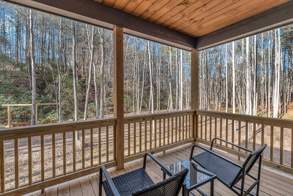 246 Woodward Way Talking Rock, GA 30175 - Photo 28 of 39 a view of a two chairs in the balcony