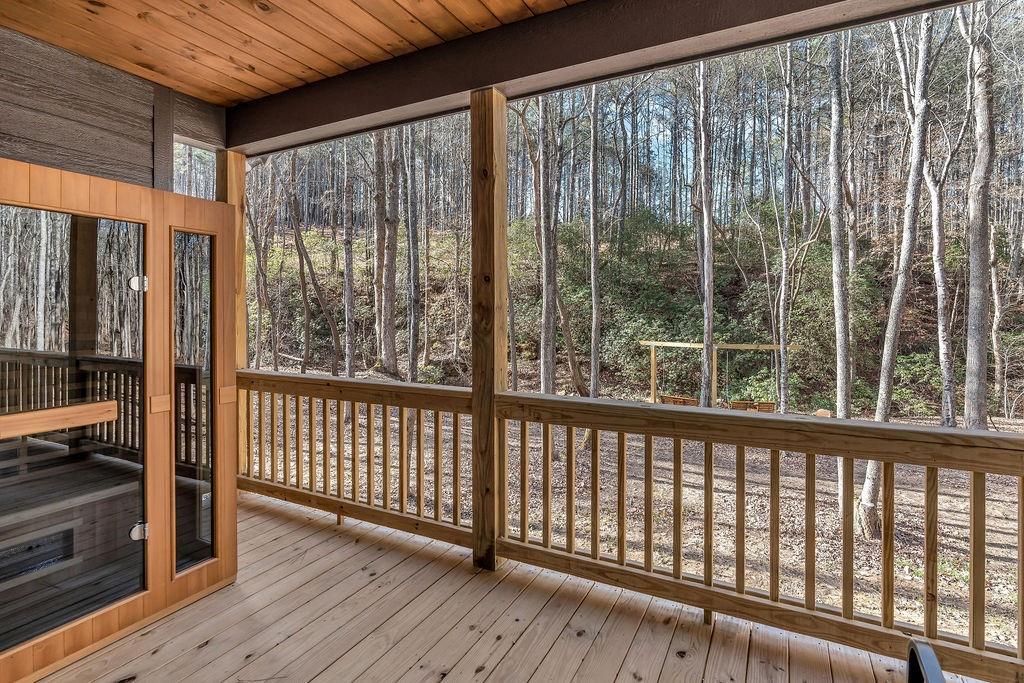 246 Woodward Way Talking Rock, GA 30175 - Photo 30 of 39 a view of a porch with wooden floor