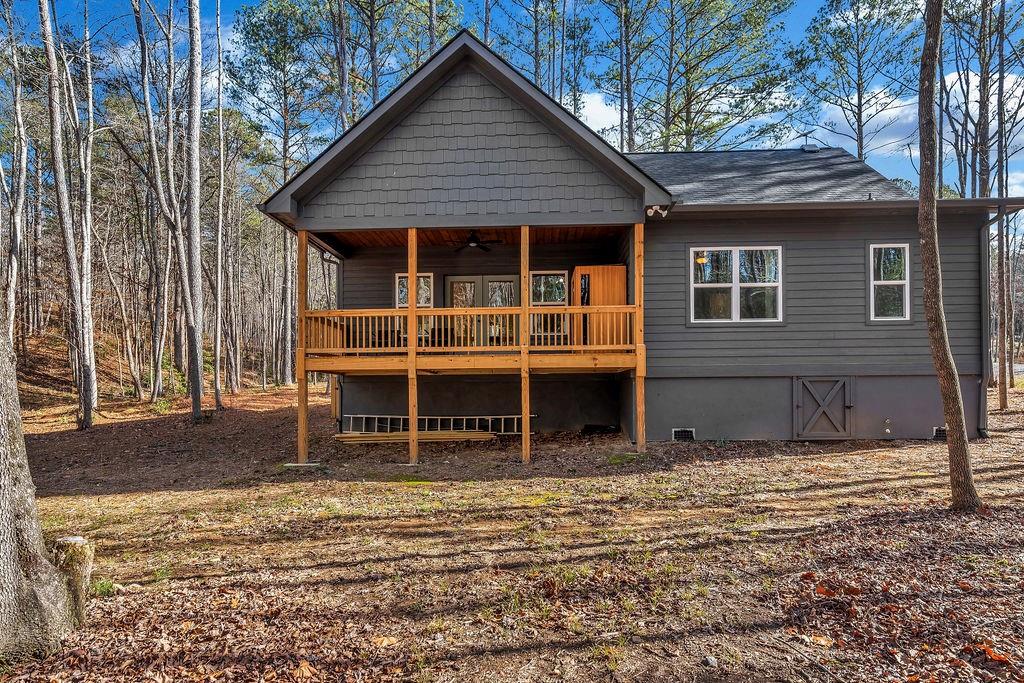 246 Woodward Way Talking Rock, GA 30175 - Photo 33 of 39 a view of a house with a yard