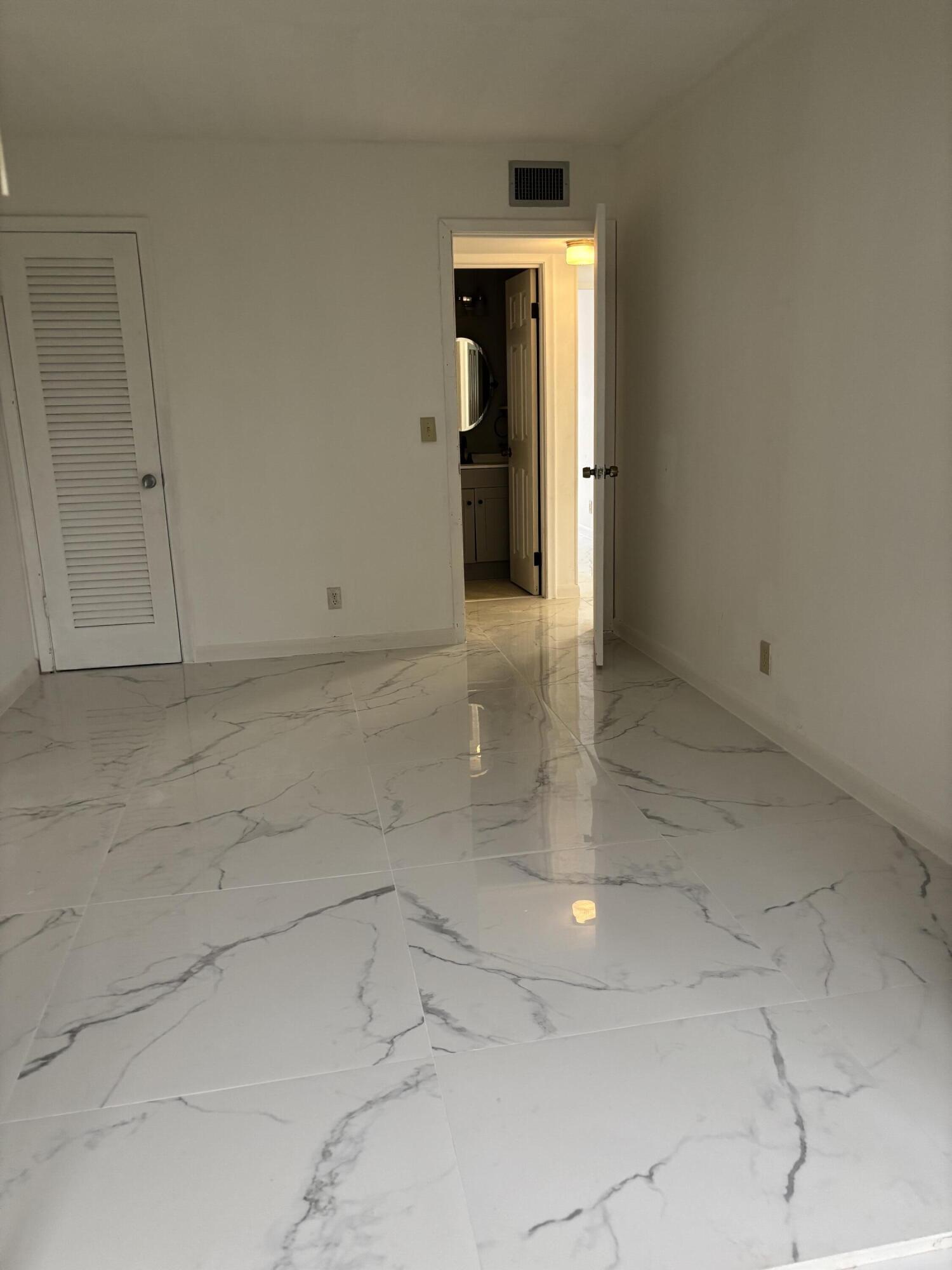 204 Salisbury I, Unit 204 West Palm Beach, FL 33417 - Photo 5 of 14 a view of an empty room