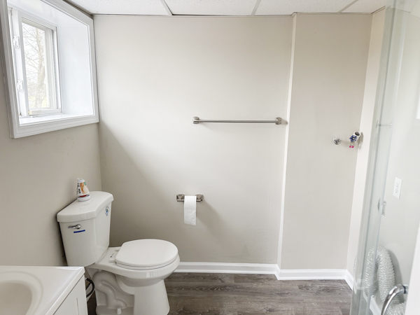 5644 Crestwood Road Matteson, IL 60443 - Photo 18 of 20 a white toilet sitting next to a bathroom sink