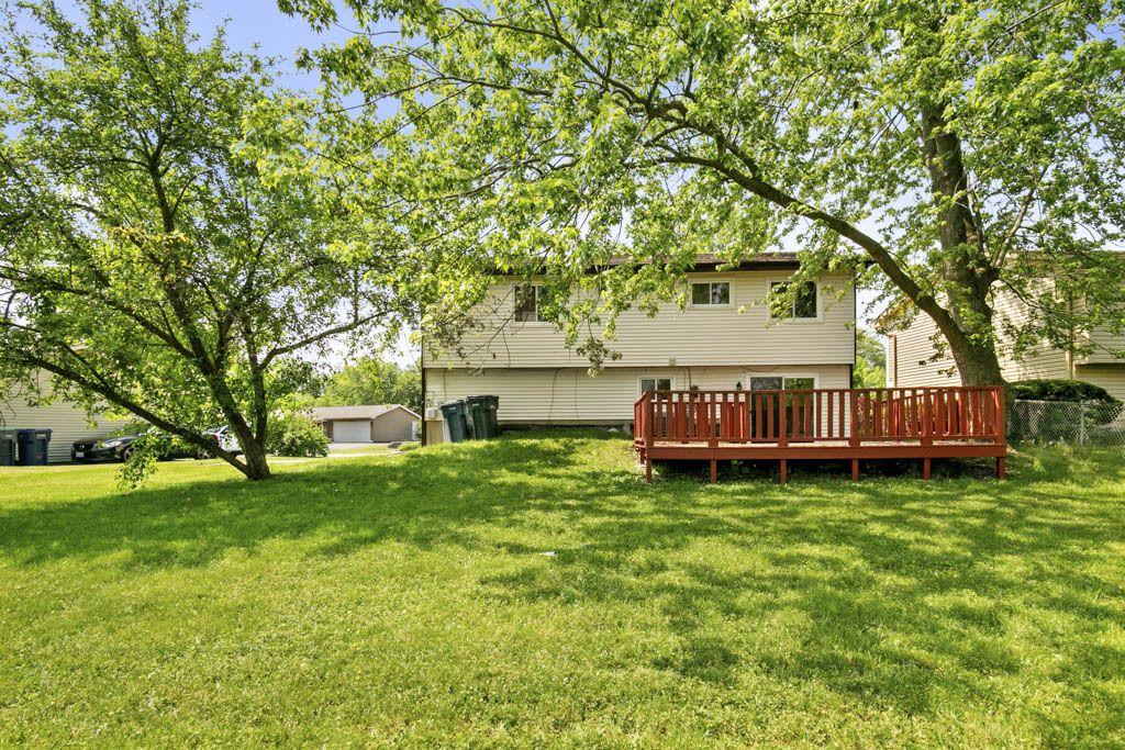 5644 Crestwood Road Matteson, IL 60443 - Photo 19 of 20 a view of a house with a yard