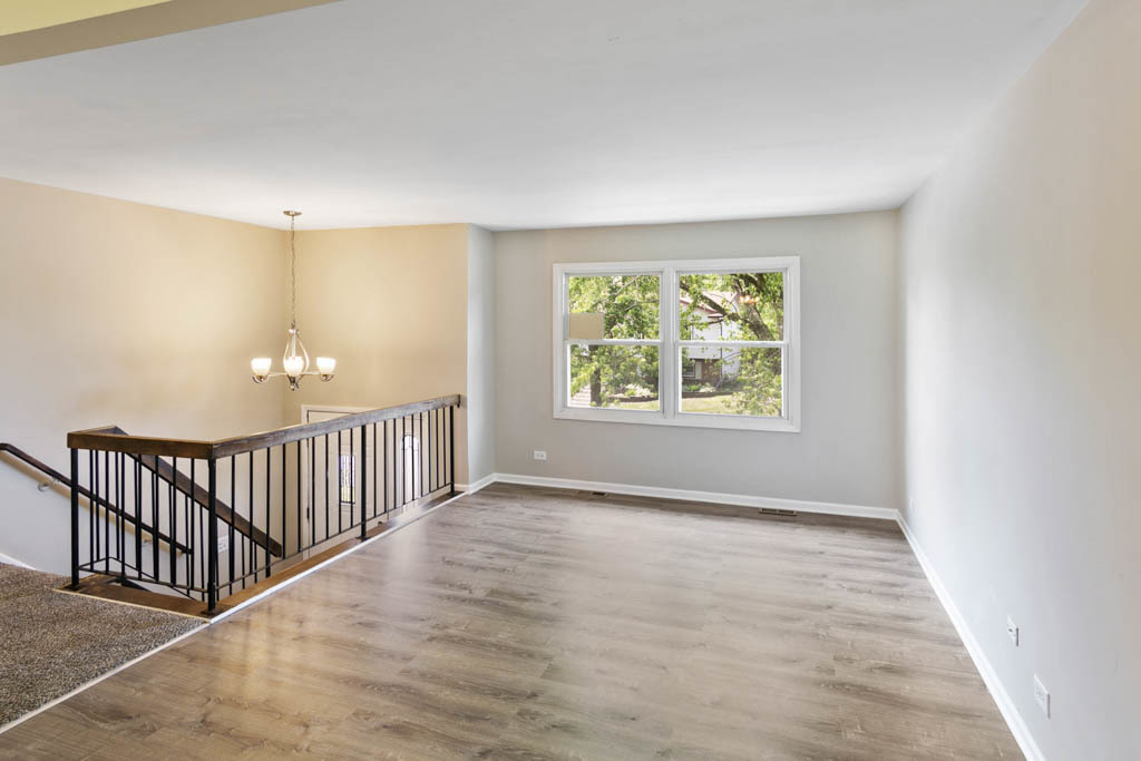 5644 Crestwood Road Matteson, IL 60443 - Photo 5 of 20 an empty room with windows