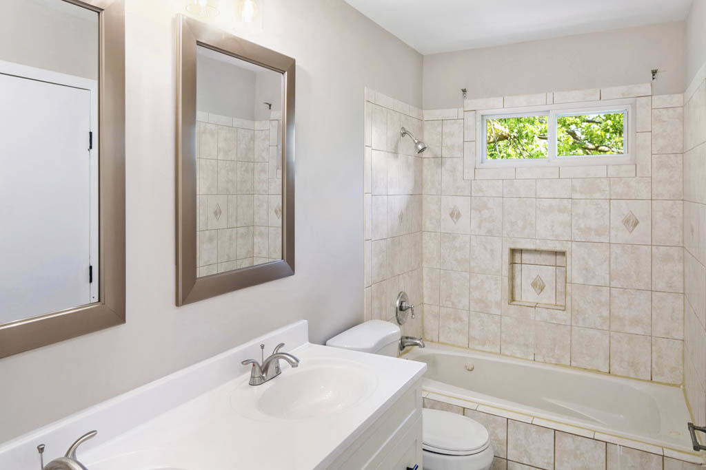 5644 Crestwood Road Matteson, IL 60443 - Photo 6 of 20 a bathroom with a sink a toilet and shower