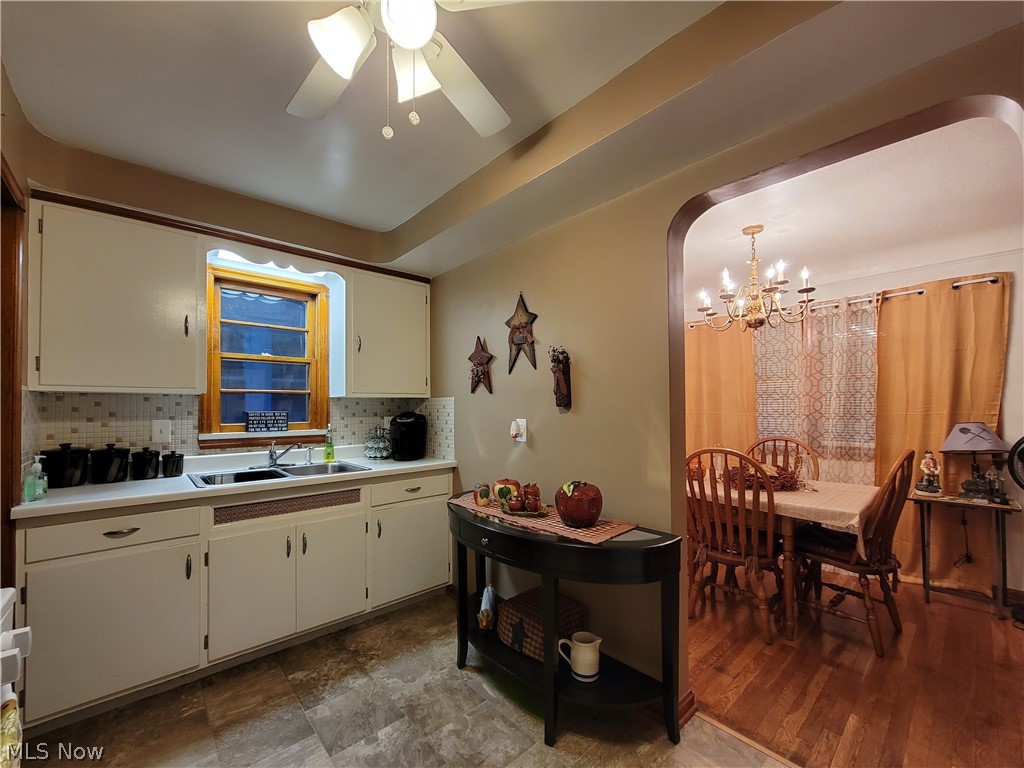 3908 Snow Road Cleveland, OH 44134 - Photo 4 of 29 Kitchen open into lrg. dining room. Nice tray ceilings!