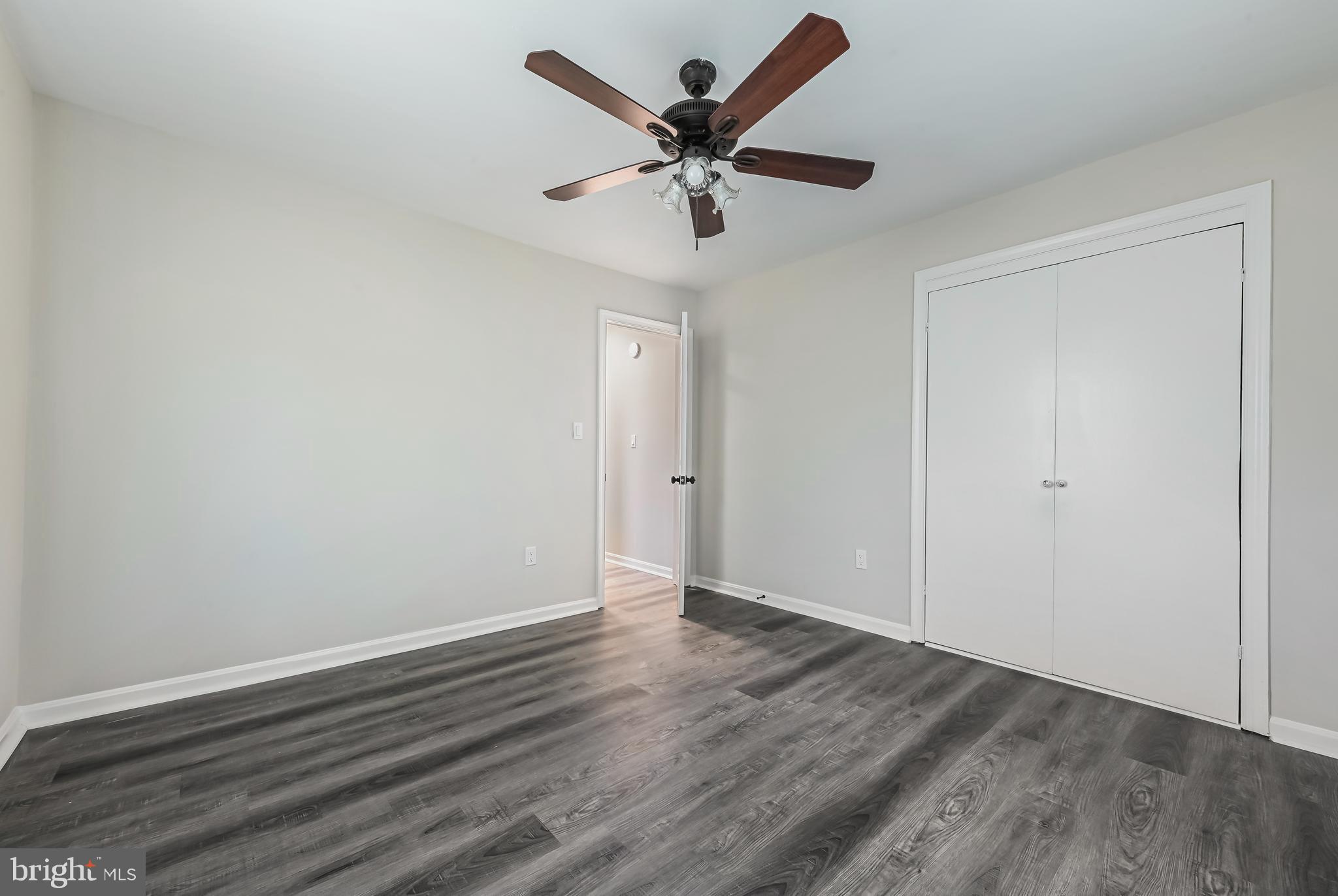 313 Orchard Road Edgewater, MD 21037 - Photo 18 of 48 wooden floor in an empty room