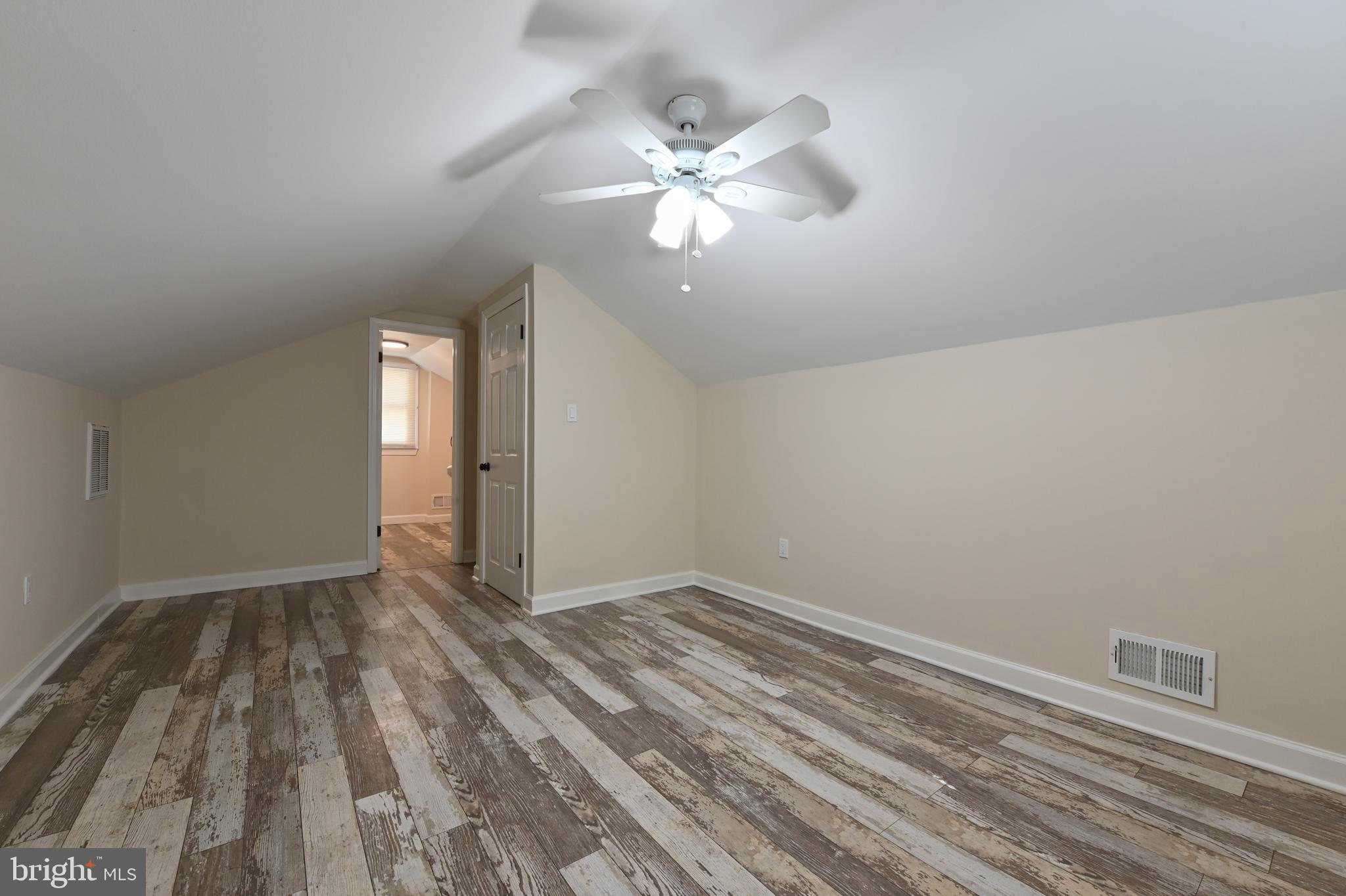 313 Orchard Road Edgewater, MD 21037 - Photo 23 of 48 wooden floor in an empty room with a window