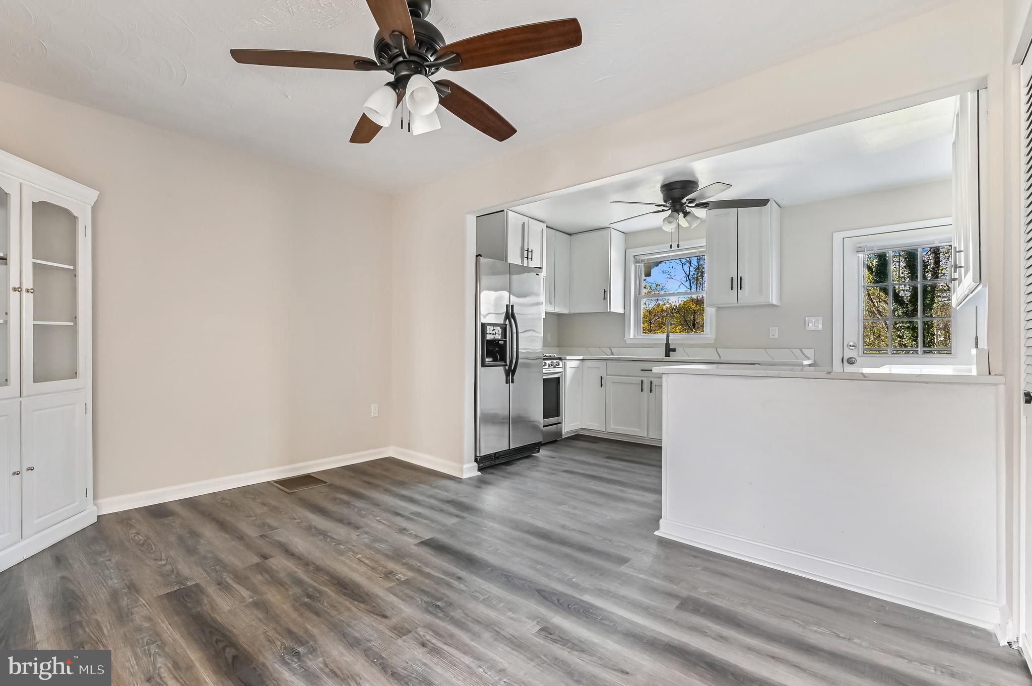 313 Orchard Road Edgewater, MD 21037 - Photo 25 of 48 a view of a kitchen with a sink and dishwasher cabinets